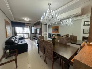 Apartamento com vista para o mar mobiliado de 2 dormitórios, sendo 1 suíte com closet, 2 v
